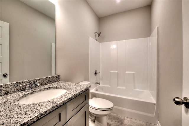 full bathroom with tile patterned flooring, bathtub / shower combination, vanity, and toilet