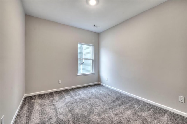 spare room featuring carpet flooring