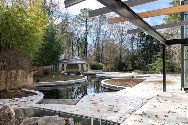 exterior space featuring an outbuilding and a patio area