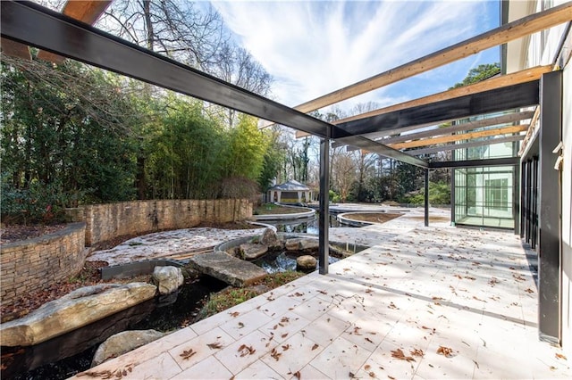 view of patio featuring a pergola