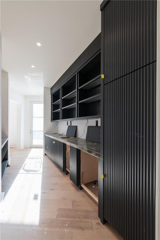 home office featuring light hardwood / wood-style flooring