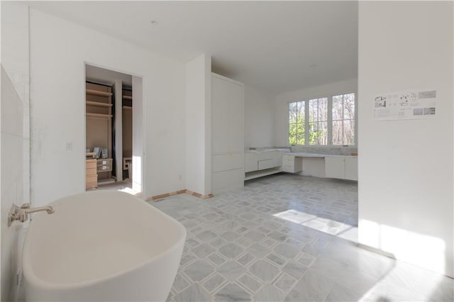 interior space with a tub to relax in