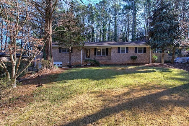 ranch-style home with a front yard