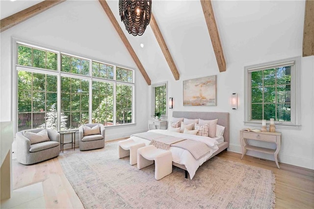 3146 Frontenac Ct NE, Atlanta, GA 30319 - bedroom with beamed ceiling, high vaulted ceiling, wood finished floors, and baseboards