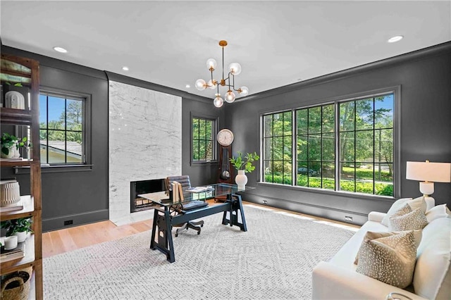 3146 Frontenac Ct NE, Atlanta, GA 30319 - office with wood finished floors, a chandelier, recessed lighting, a premium fireplace, and baseboards