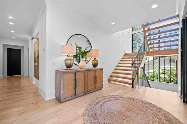 3146 Frontenac Ct NE, Atlanta, GA 30319 - hallway with light wood-type flooring, healthy amount of natural light, baseboards, recessed lighting, and stairway