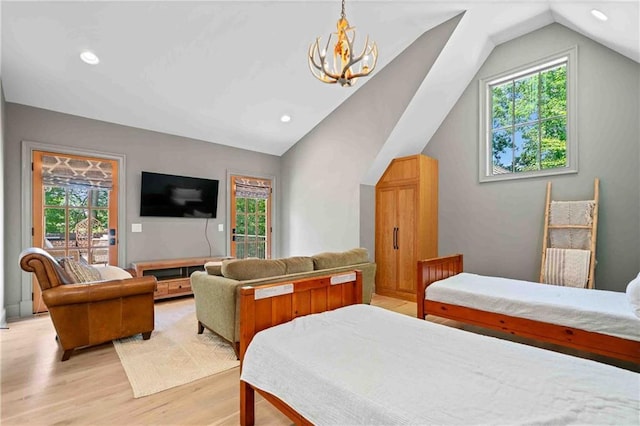3146 Frontenac Ct NE, Atlanta, GA 30319 - bedroom featuring lofted ceiling, light wood finished floors, multiple windows, access to outside, and recessed lighting