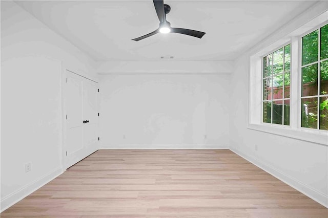 3146 Frontenac Ct NE, Atlanta, GA 30319 - empty room with a ceiling fan, light wood-type flooring, and baseboards