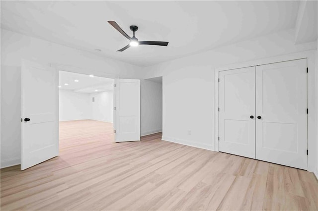 3146 Frontenac Ct NE, Atlanta, GA 30319 - unfurnished bedroom featuring light wood finished floors, baseboards, a closet, a ceiling fan, and recessed lighting