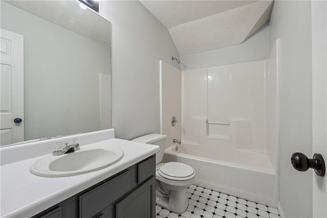2205 Dresden Grn NW, Kennesaw, GA 30144 - full bath with shower / washtub combination, toilet, vanity, lofted ceiling, and a textured ceiling