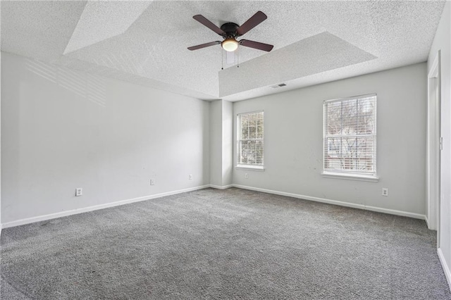 2205 Dresden Grn NW, Kennesaw, GA 30144 - carpeted empty room featuring visible vents, a textured ceiling, baseboards, and ceiling fan