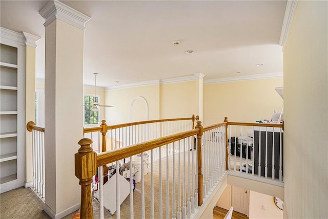 hallway featuring crown molding