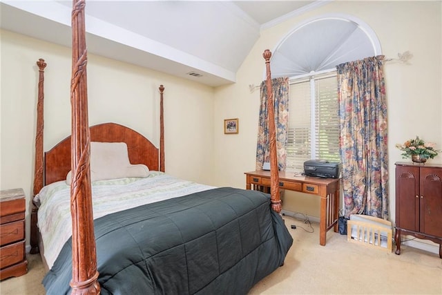 carpeted bedroom featuring crown molding and lofted ceiling