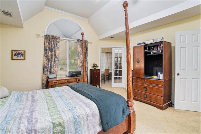 carpeted bedroom featuring vaulted ceiling and ornamental molding