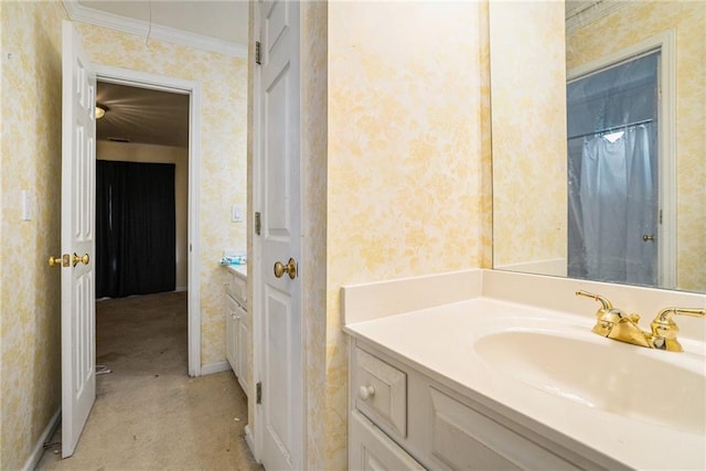 bathroom with vanity and crown molding