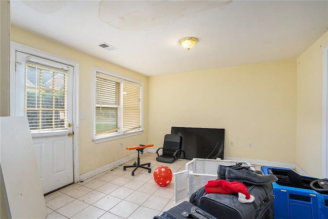 interior space featuring light tile patterned floors