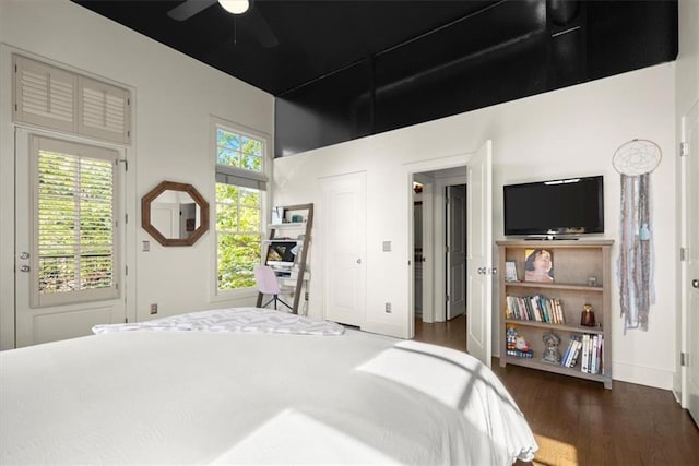 bedroom featuring ceiling fan and wood finished floors