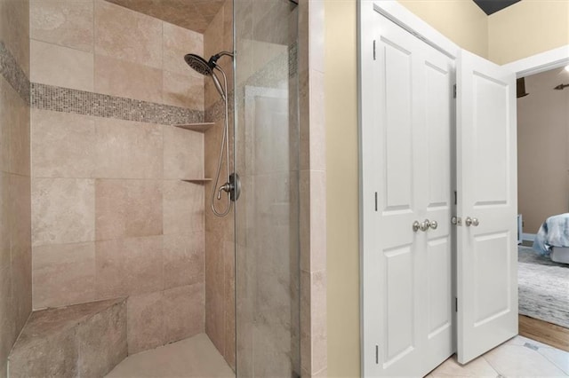 bathroom featuring a tile shower