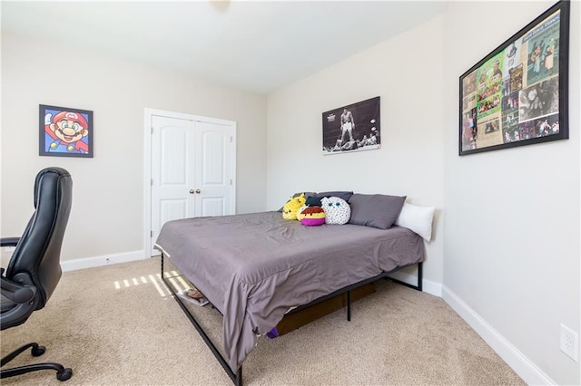 carpeted bedroom featuring a closet