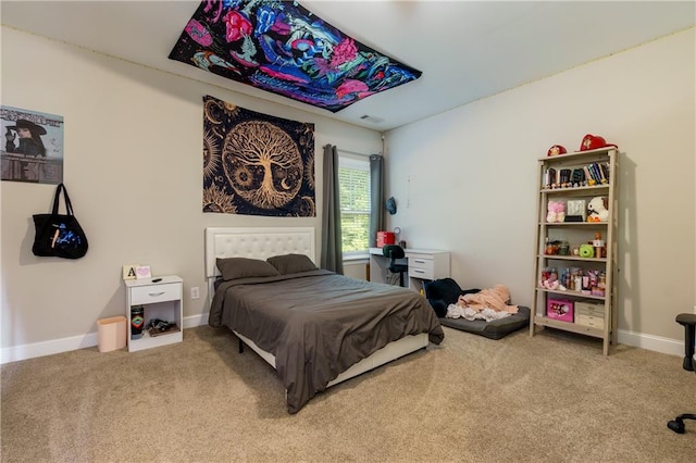 bedroom featuring carpet