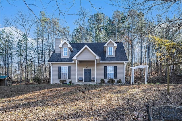 view of new england style home