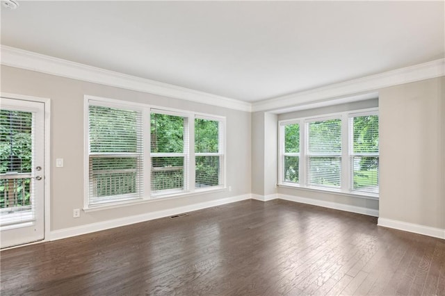 1036 Grant Park Rd, Decatur, GA 30033 - spare room with ornamental molding, dark wood-style flooring, and baseboards