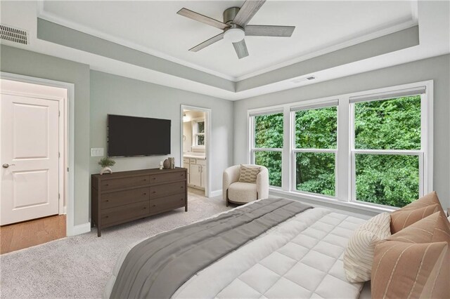 1036 Grant Park Rd, Decatur, GA 30033 - bedroom featuring light carpet, a tray ceiling, baseboards, crown molding, and ceiling fan