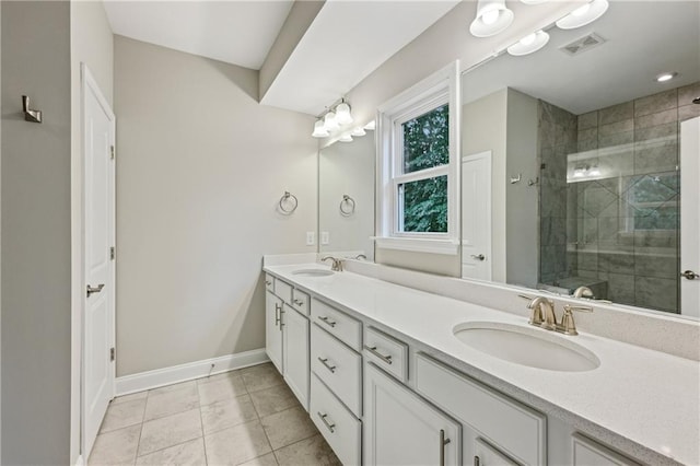 1036 Grant Park Rd, Decatur, GA 30033 - full bathroom with double vanity, a stall shower, baseboards, and tile patterned floors