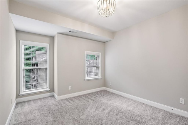 1036 Grant Park Rd, Decatur, GA 30033 - empty room with carpet floors, plenty of natural light, and baseboards