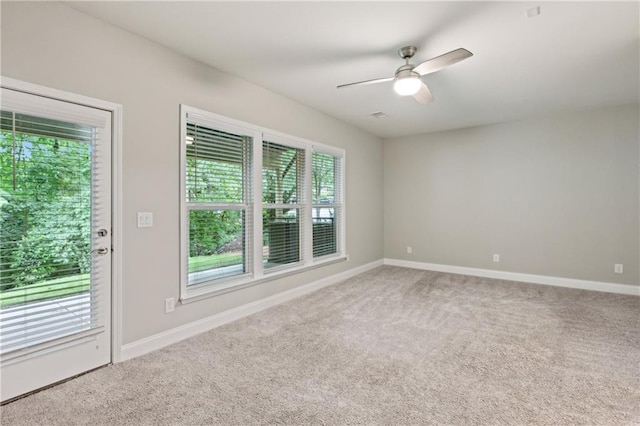 1036 Grant Park Rd, Decatur, GA 30033 - carpeted spare room with a ceiling fan and baseboards