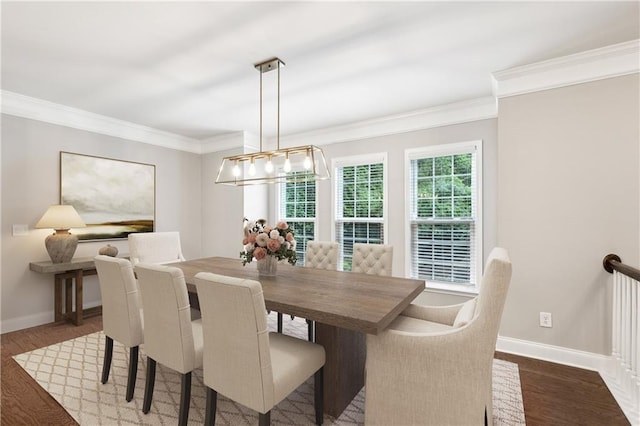 1036 Grant Park Rd, Decatur, GA 30033 - dining space featuring wood finished floors, baseboards, crown molding, and a chandelier