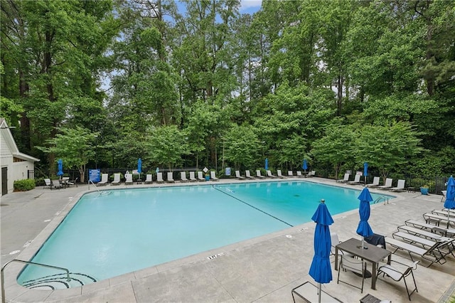 1036 Grant Park Rd, Decatur, GA 30033 - community pool featuring view of scattered trees and a patio