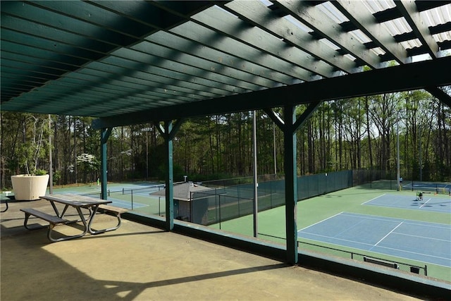 1036 Grant Park Rd, Decatur, GA 30033 - view of community with a tennis court and a wooded view