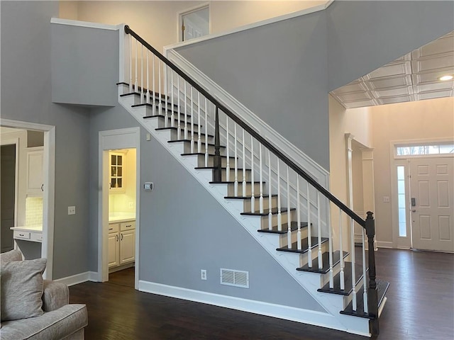 stairs with wood-type flooring