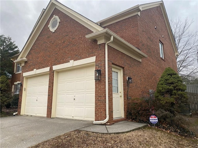 view of property exterior with a garage