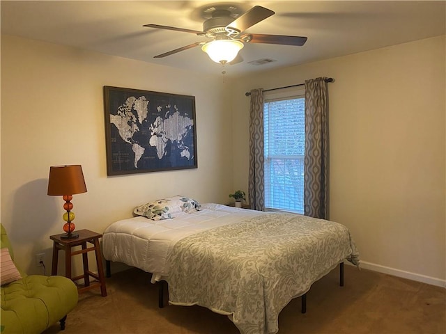 carpeted bedroom featuring ceiling fan