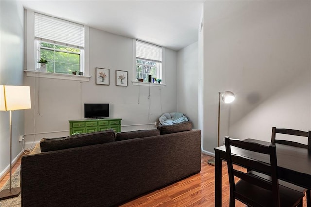 1031 State St NW Unit 106, Atlanta, GA 30318 - living room featuring wood finished floors and baseboards
