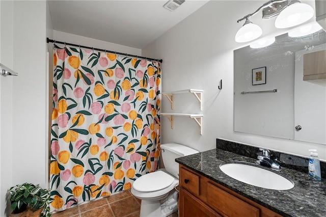 1031 State St NW Unit 106, Atlanta, GA 30318 - full bath with vanity, toilet, tile patterned floors, and a shower with shower curtain