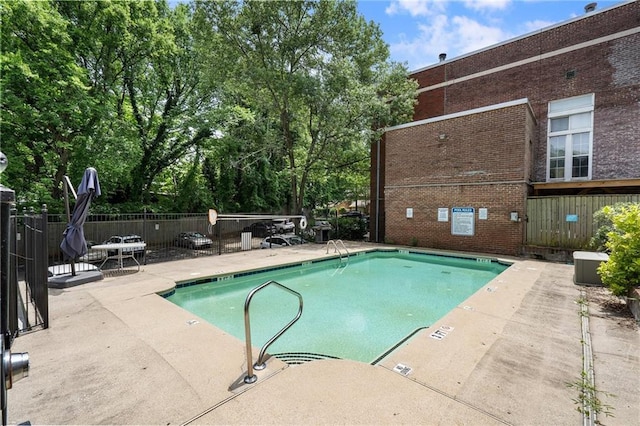 1031 State St NW Unit 106, Atlanta, GA 30318 - community pool with a patio