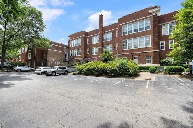 1031 State St NW Unit 106, Atlanta, GA 30318 - view of property featuring uncovered parking