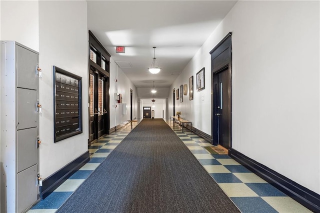 1031 State St NW Unit 106, Atlanta, GA 30318 - hallway with tile patterned floors and baseboards