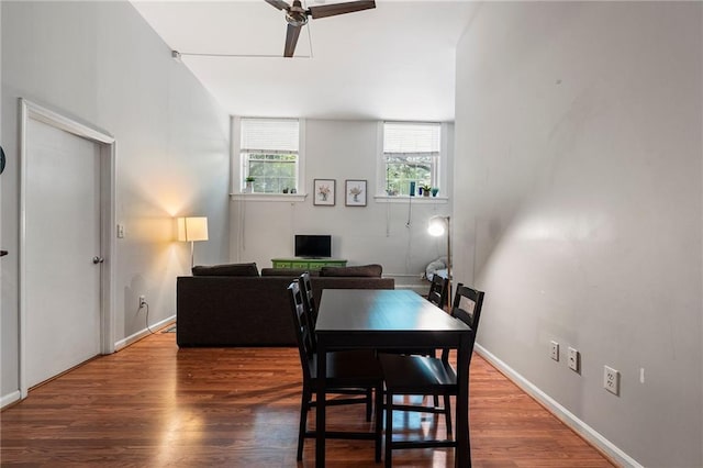 1031 State St NW Unit 106, Atlanta, GA 30318 - dining area featuring a ceiling fan, baseboards, and wood finished floors
