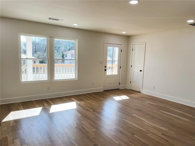 interior space with dark hardwood / wood-style flooring