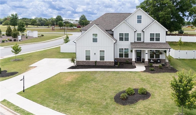 view of front of home featuring a front lawn