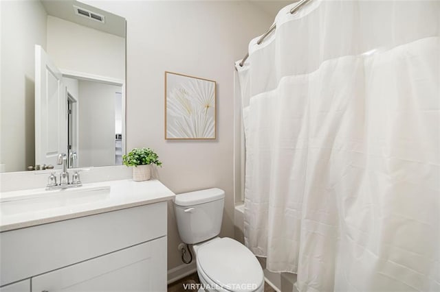 full bathroom featuring visible vents, toilet, and vanity