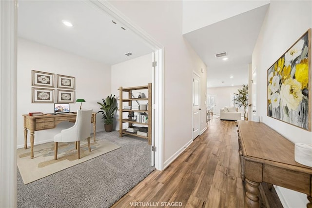 office area featuring visible vents, recessed lighting, baseboards, and wood finished floors