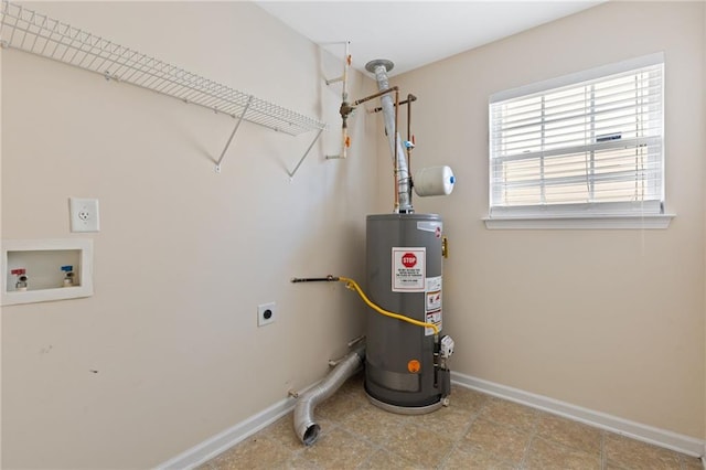 utility room featuring gas water heater