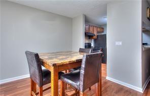 586 Windchase Ln, Stone Mountain, GA 30083 - dining space with wood finished floors and baseboards