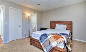 586 Windchase Ln, Stone Mountain, GA 30083 - carpeted bedroom featuring baseboards