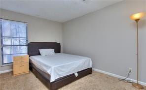 586 Windchase Ln, Stone Mountain, GA 30083 - bedroom featuring carpet and baseboards